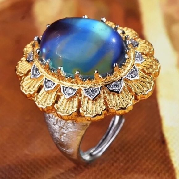 Jewelry - NWOT Gorgeous large cocktail ring with blue stone adjustable size